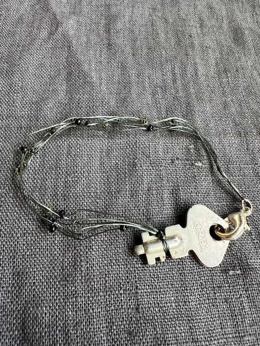 green with beads and key